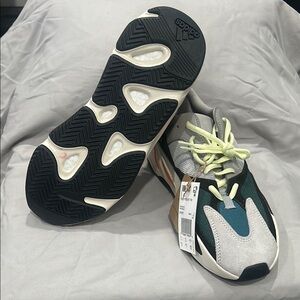 Adidas Gray and Green Athletic Shoes with Boost Cushioning